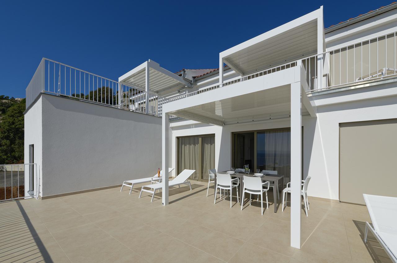 Zlatni Zalaz,Apartments,Supetarska Draga Esterno foto