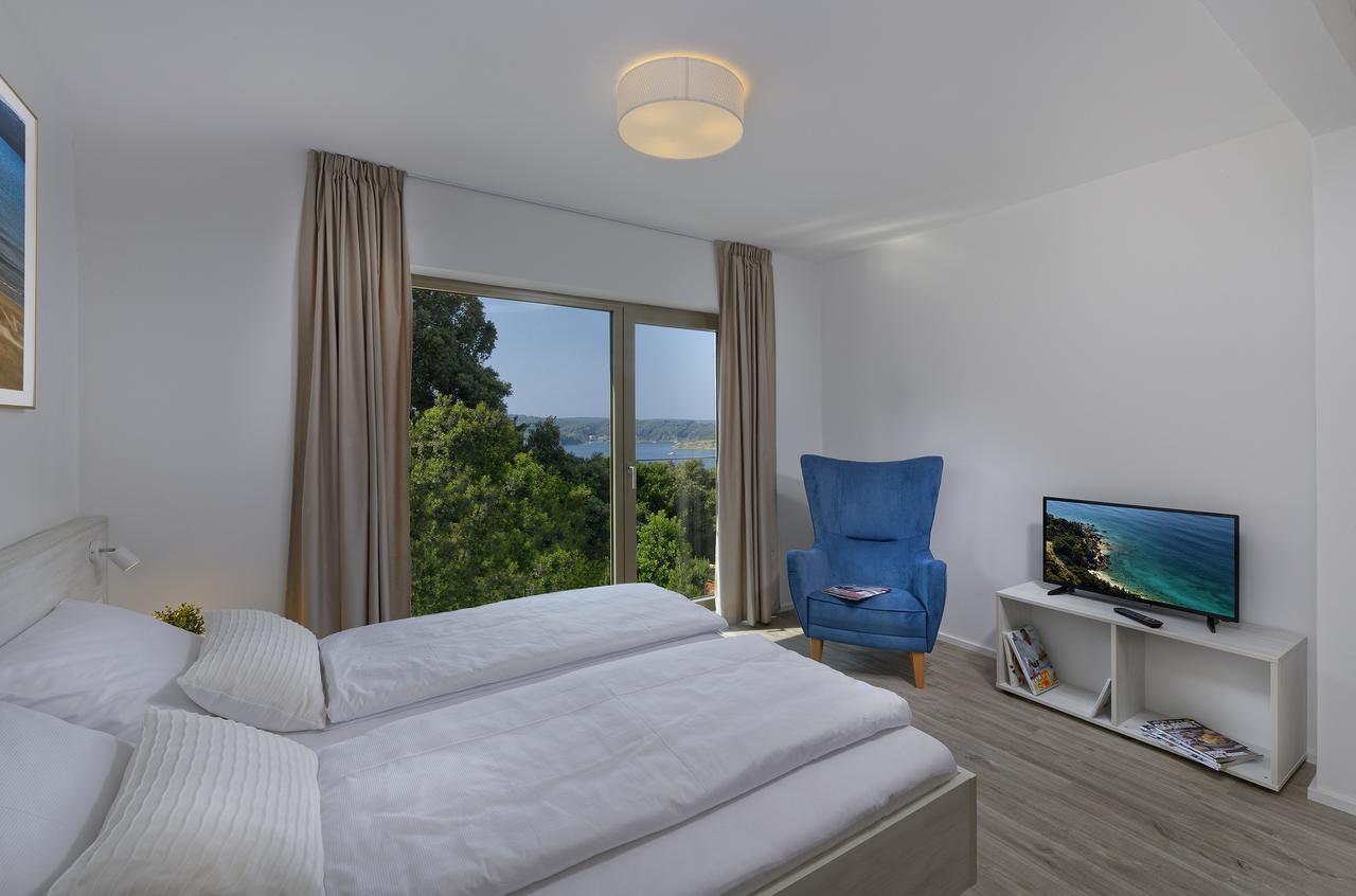 Zlatni Zalaz,Apartments,Supetarska Draga Esterno foto