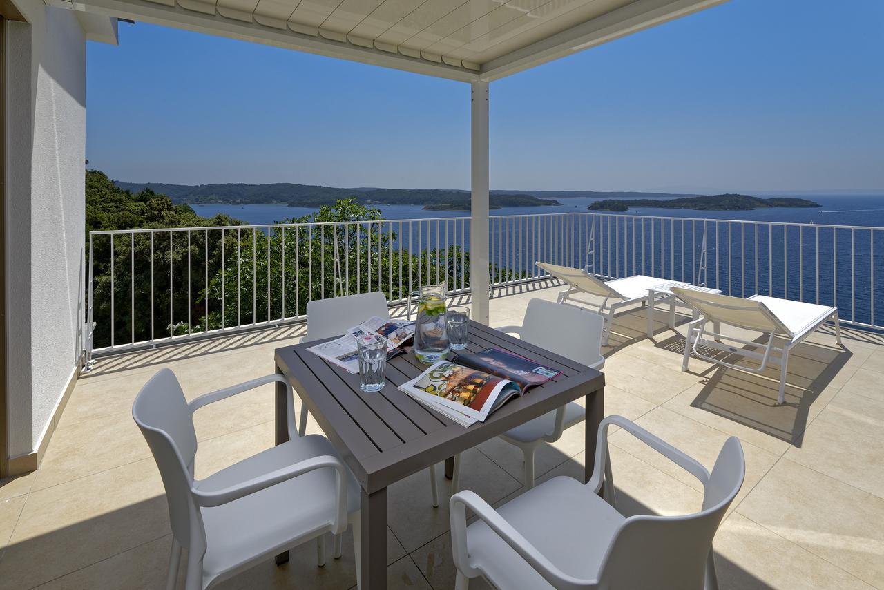 Zlatni Zalaz,Apartments,Supetarska Draga Esterno foto